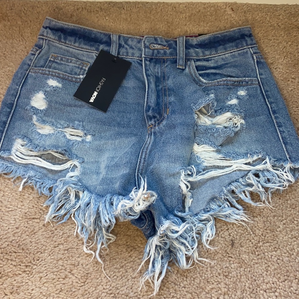 women’s distressed shorts !! NEVER WORN !!!!!